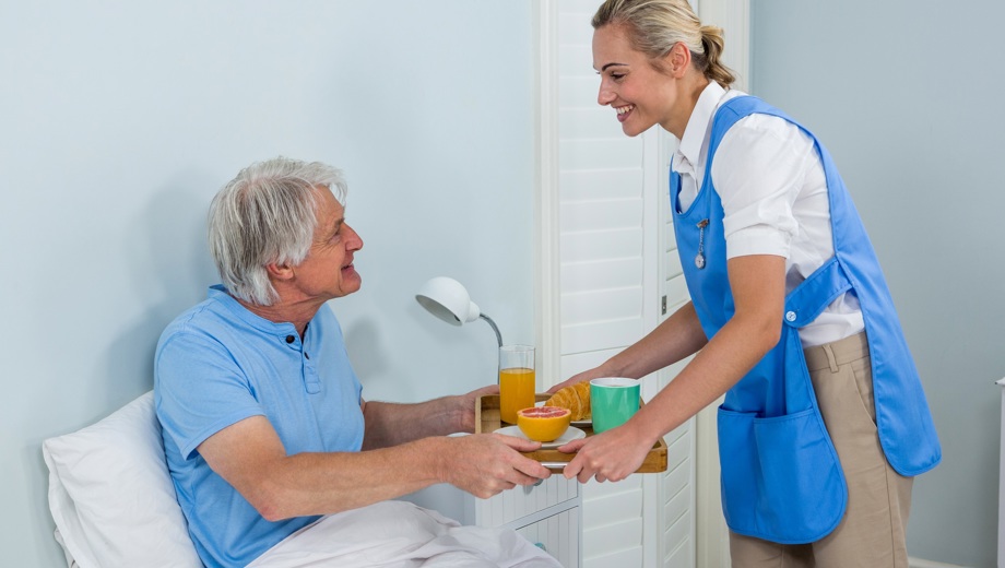 37 Nurse Offering Breakfast Senior Man Relaxing Bed KLEIN